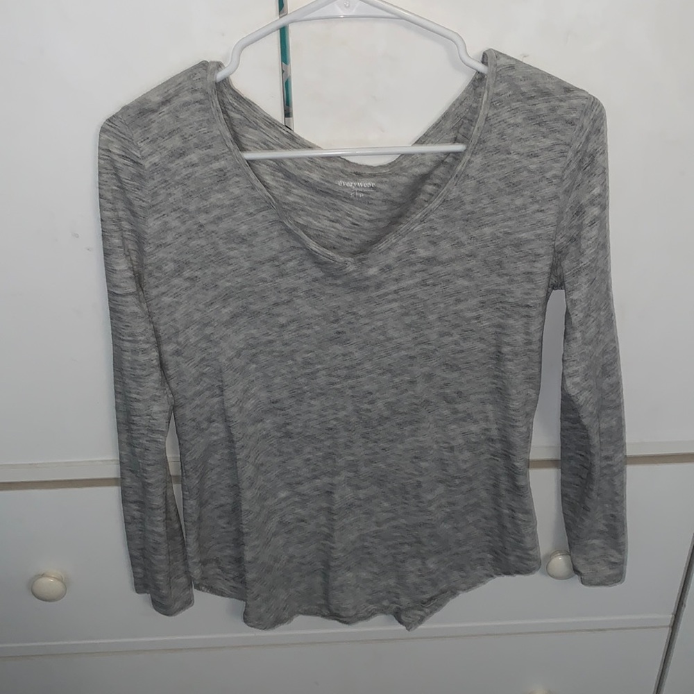 gray flowy long sleeve shirt